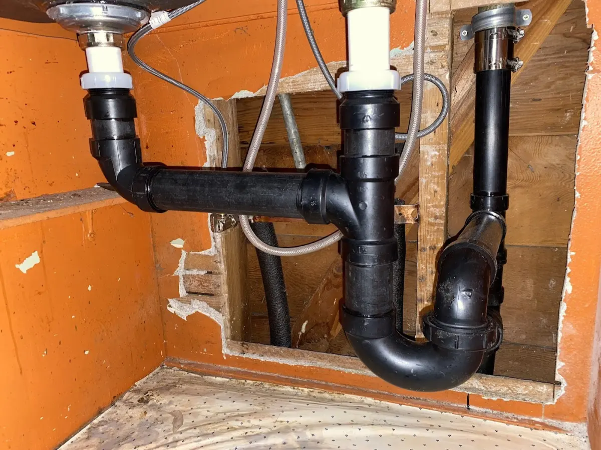 Professional Garbage Disposal Repair equipment and tools on the job in Forest Hill